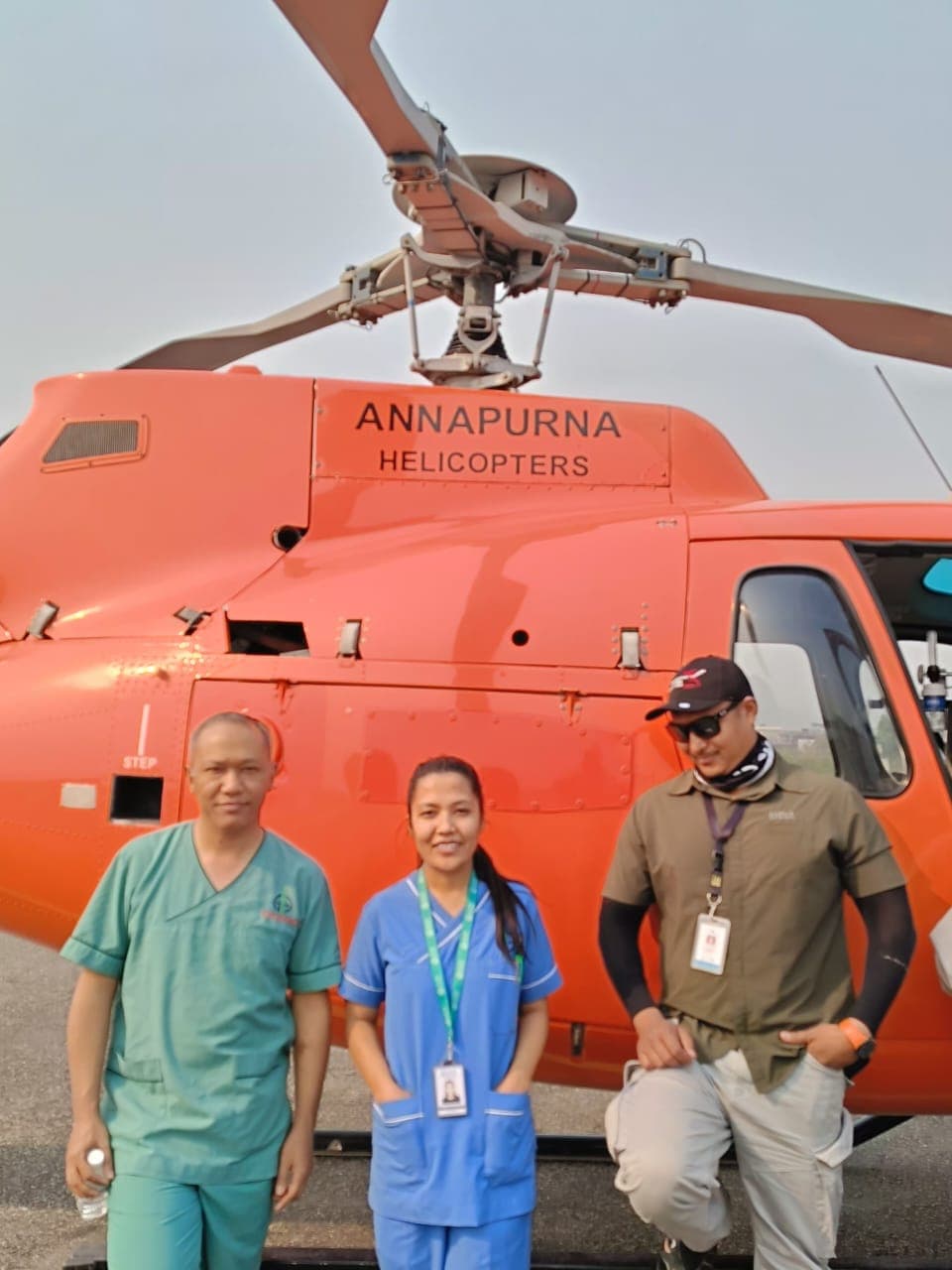 Deepa Shrestha with the transfer crew in front of the aircraft
